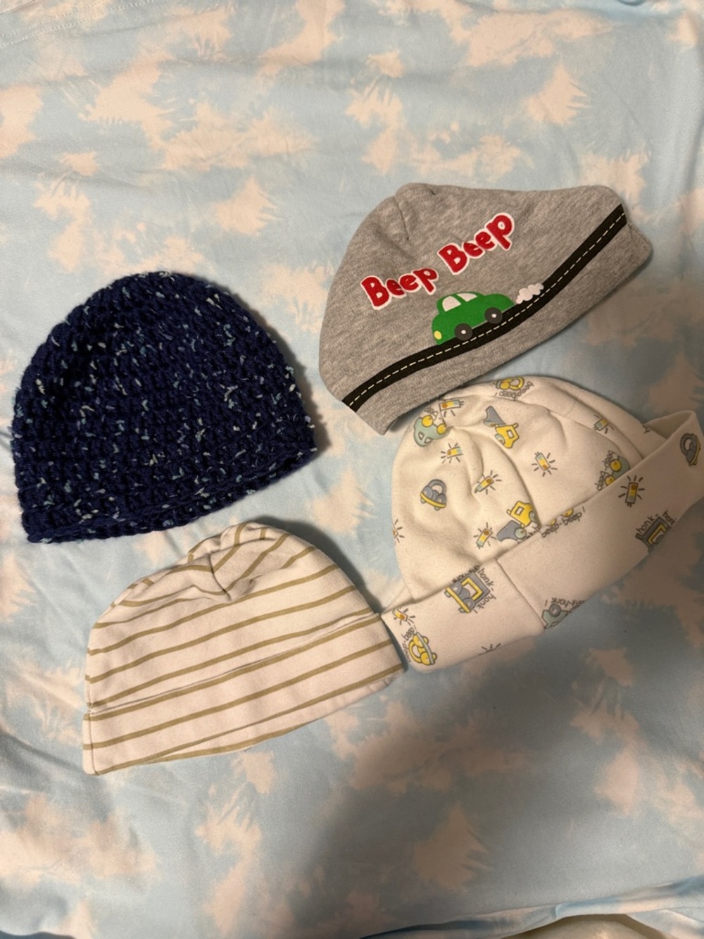 A21🫐2for $20🫐Handknit and 3 playful baby hats.